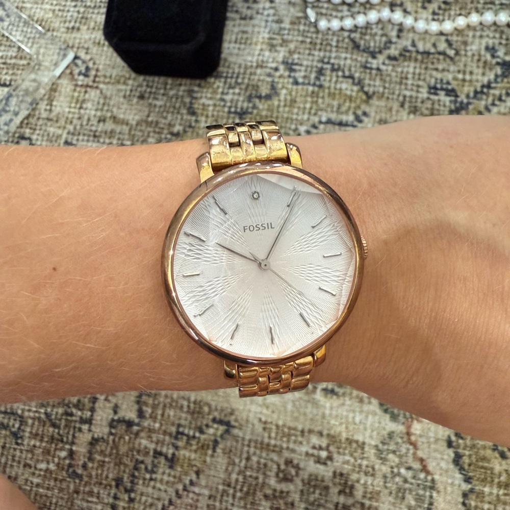 Gold fossil watch